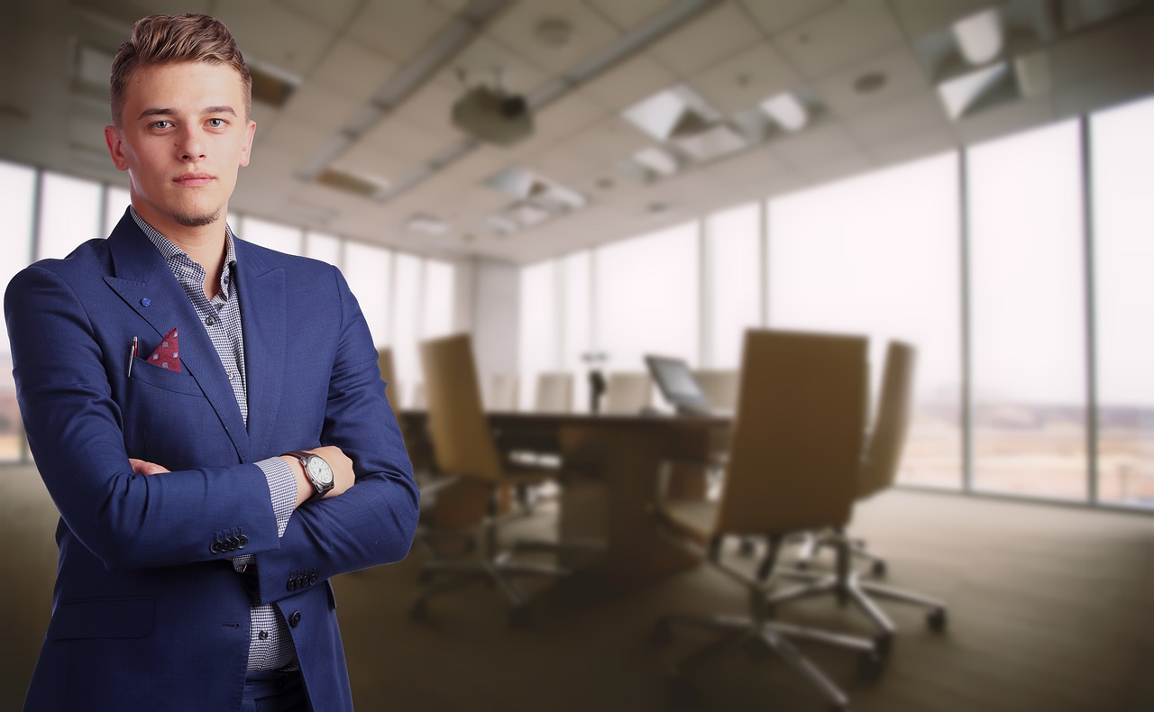 Business consultant reviewing documents at a professional meeting table